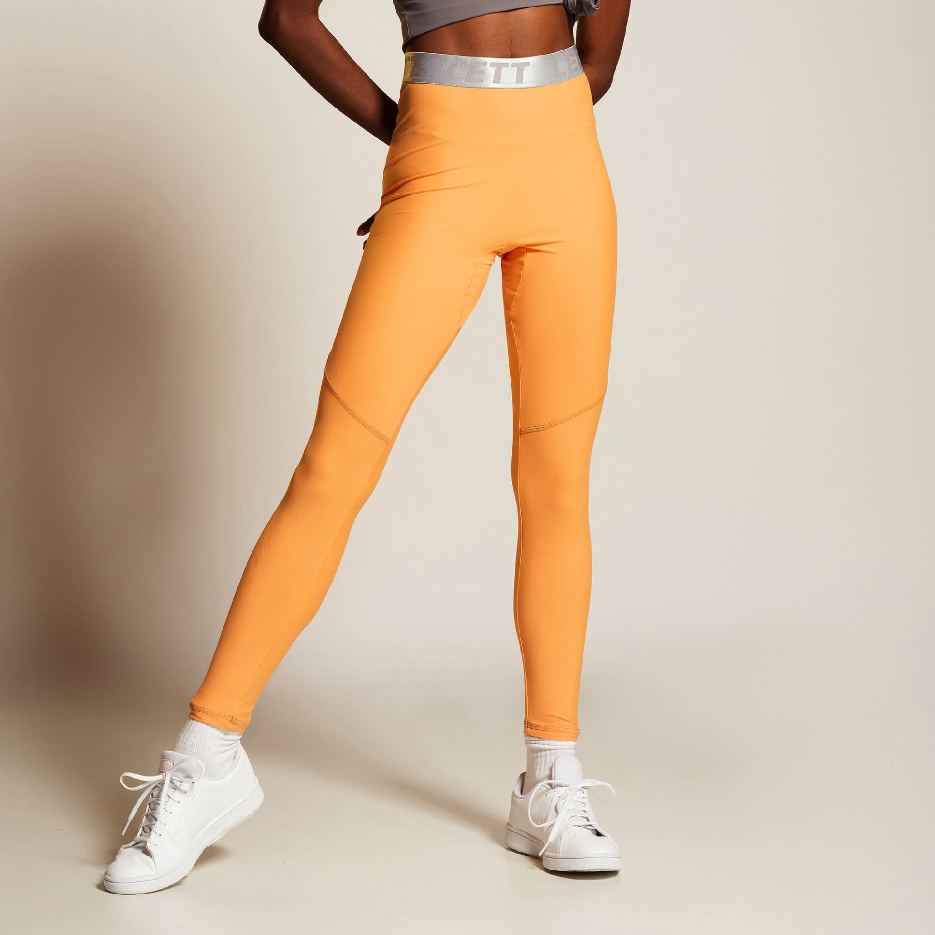 Cal a legging laranja sense Lett Sports